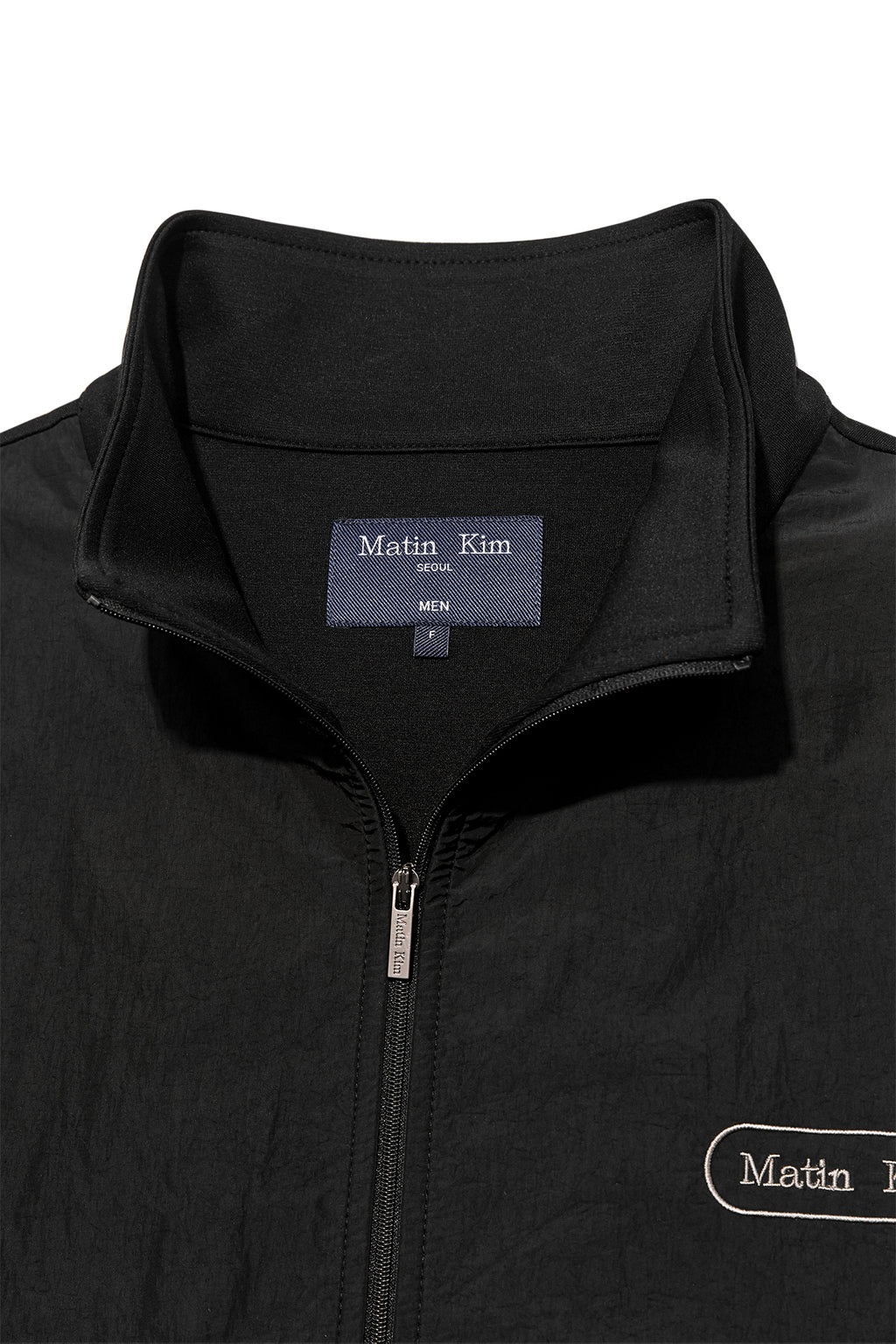[matinkim] HIGH NECK WINDBREAKER ZIP UP FOR MEN IN BLACK