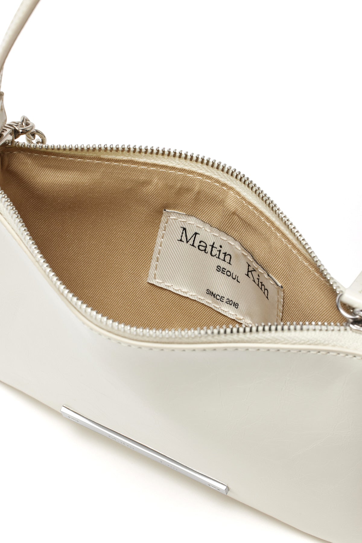 [matinkim] GLOSSY LEATHER MICRO BAG IN IVORY