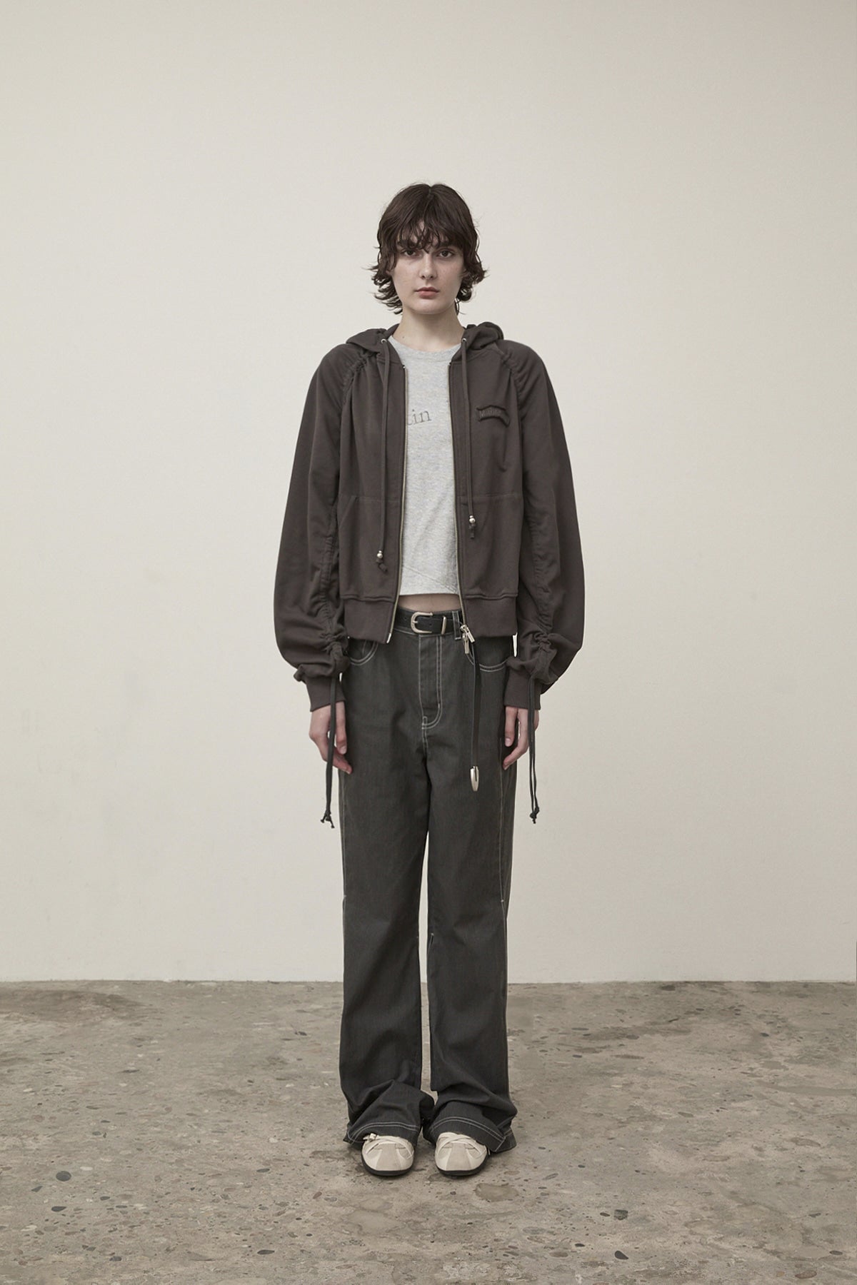 [matinkim] SLEEVE STRING DETAIL HOODY ZIP UP IN CHARCOAL