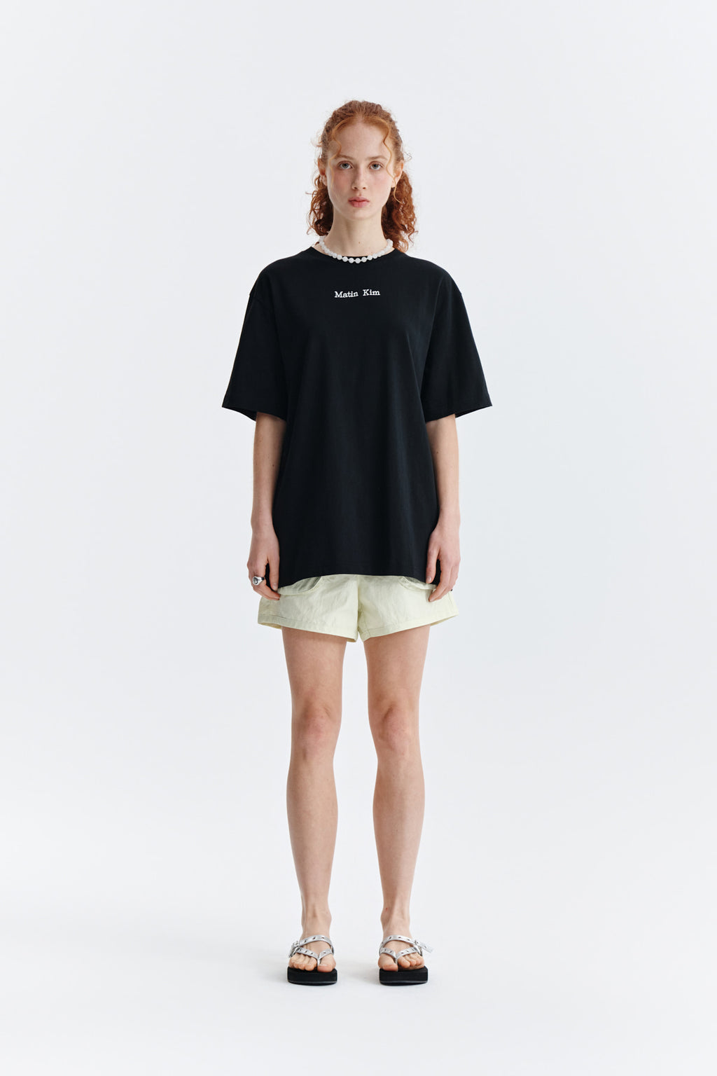 [matinkim] EMBROIDERY SMALL LOGO OVERSIZE TOP IN BLACK