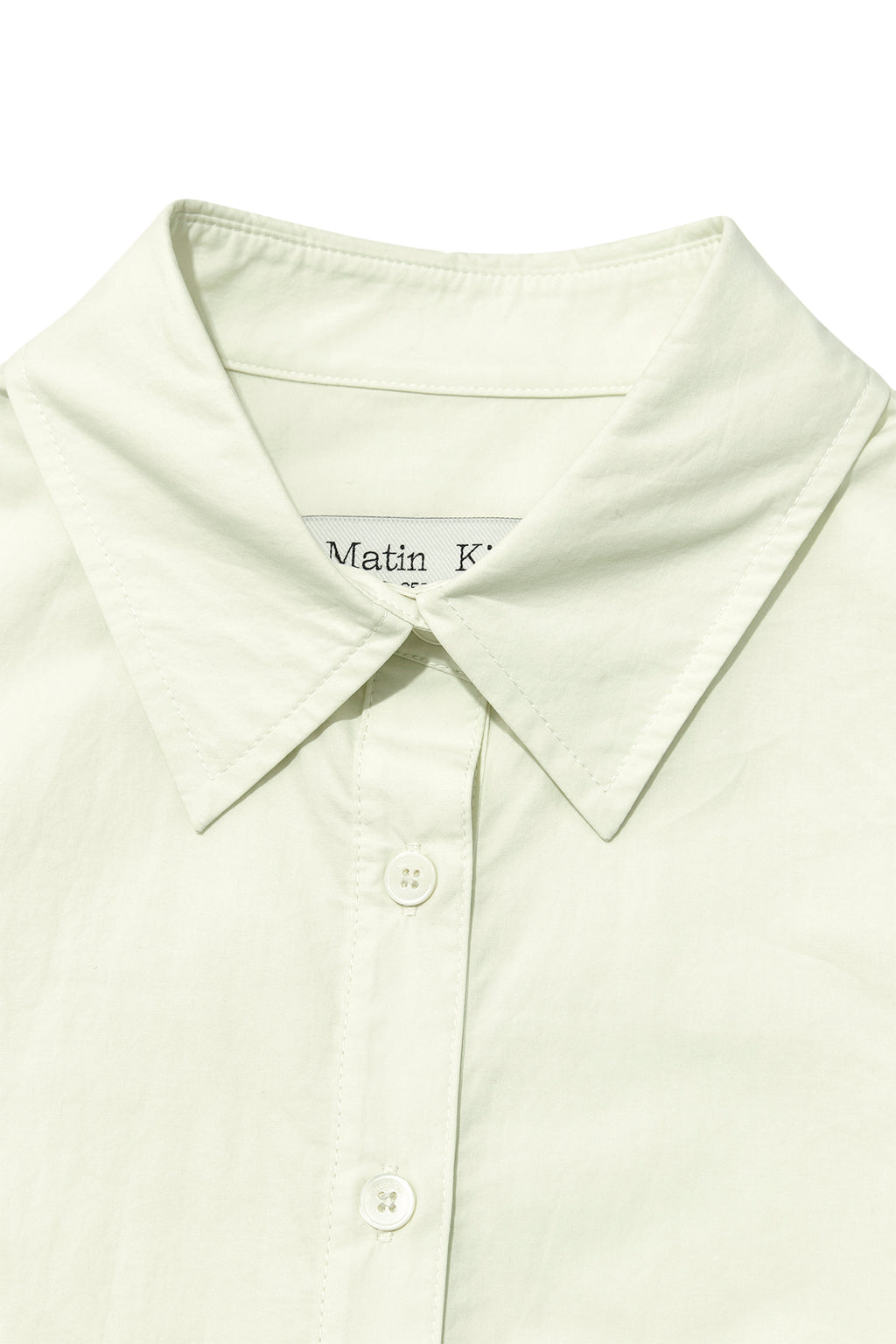 [matinkim] BACK BUTTON POINT SHIRT IN LIGHT GREEN