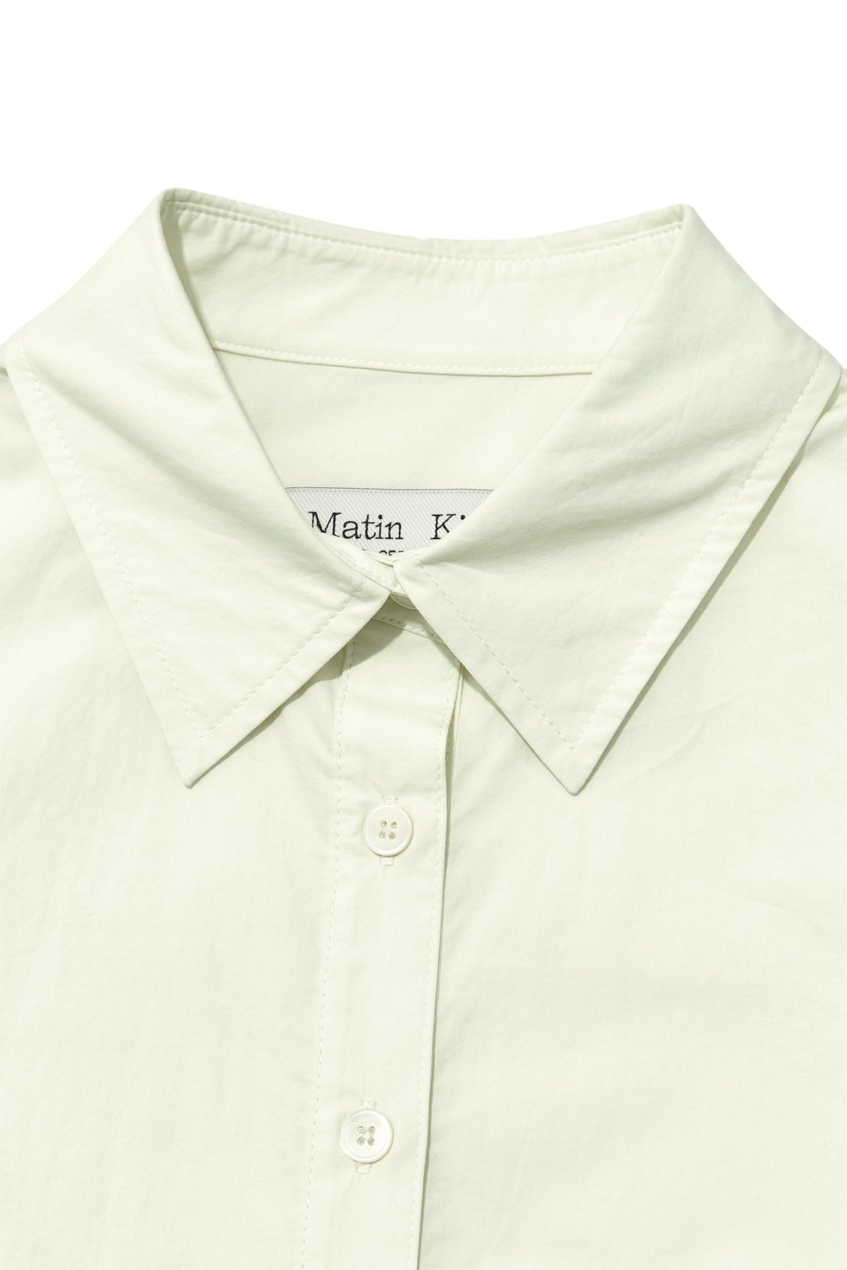 [matinkim] BACK BUTTON POINT SHIRT IN LIGHT GREEN