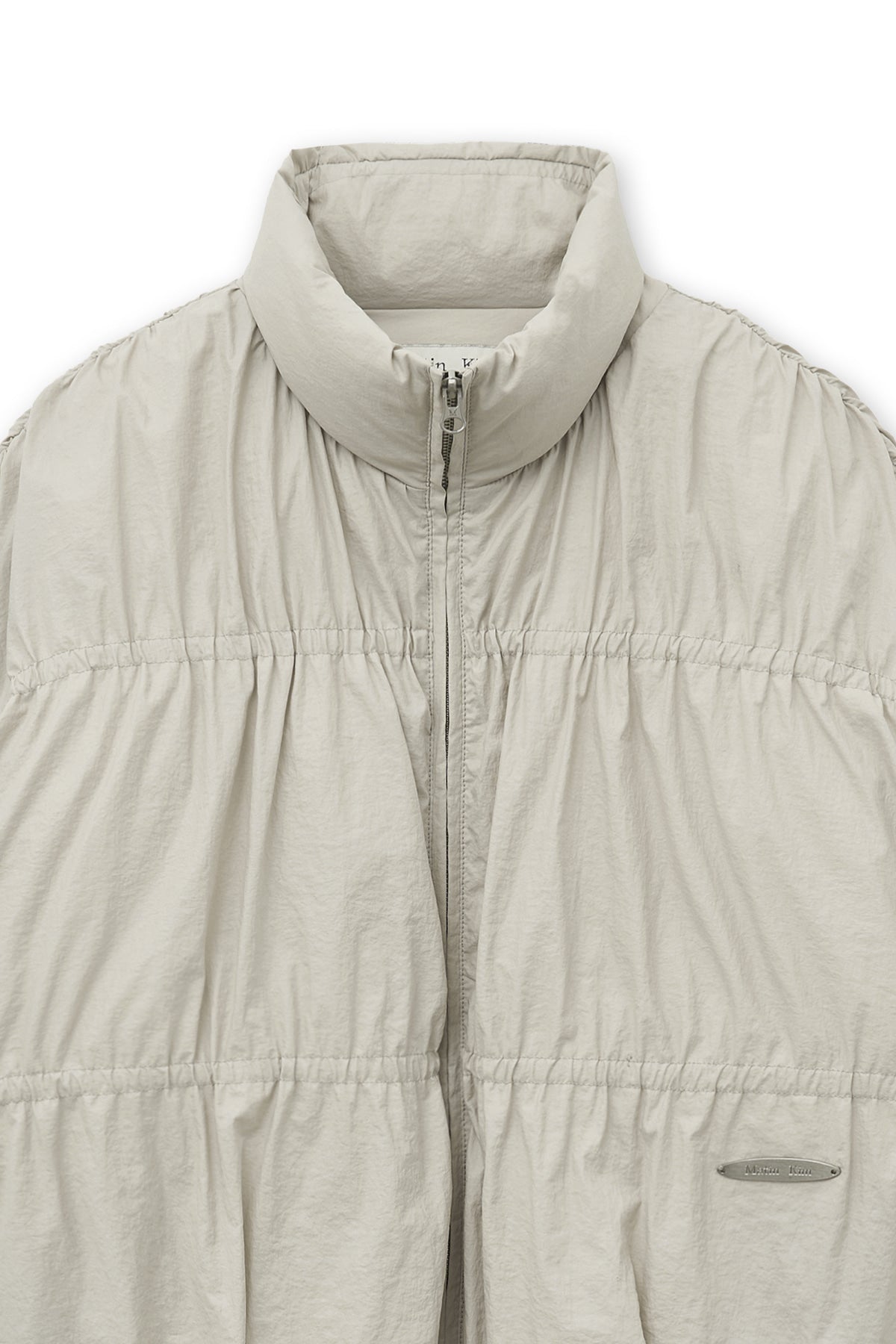 [matinkim] HIGH NECK SHIRRING DOWN JUMPER IN LIGHT BEIGE