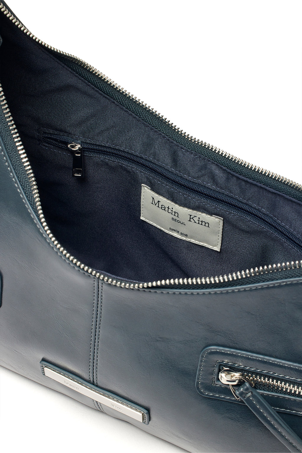 [matinkim] ASYMMETRICAL ZIPPER BAG IN CHARCOAL