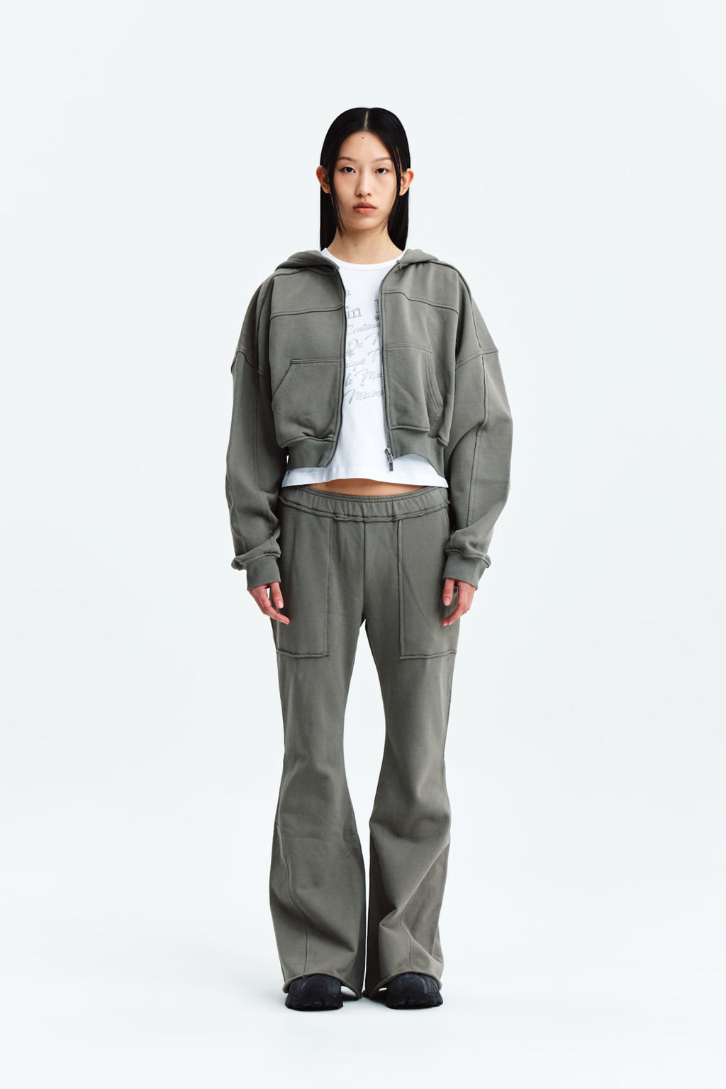 [matinkim] CUT OUT DETAIL SWEATPANTS IN KHAKI GREY