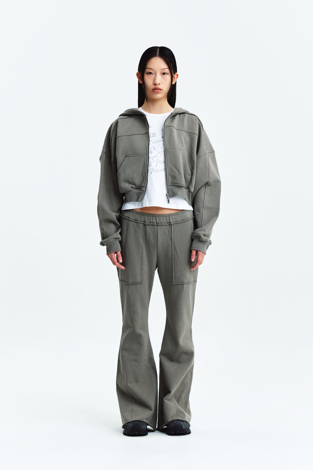 [matinkim] CUT OUT DETAIL SWEATPANTS IN KHAKI GREY