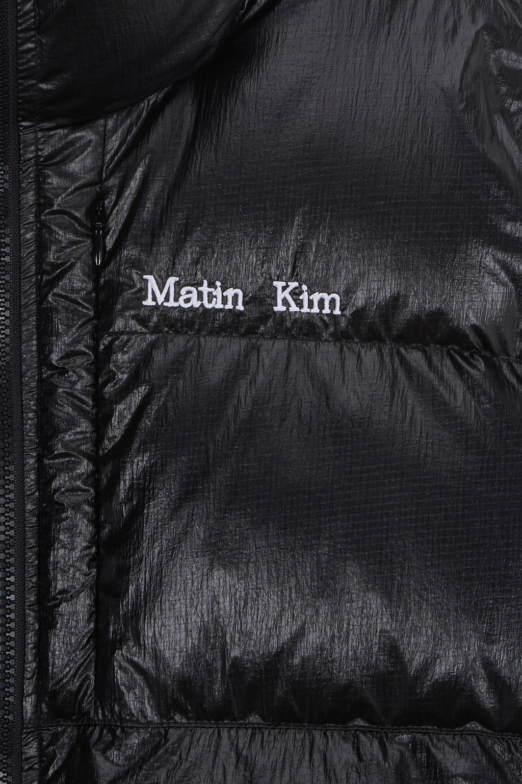 [matinkim] SMALL LOGO VOLUME DOWN JUMPER FOR MEN IN BLACK