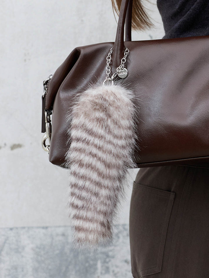 Raive Tail Charm