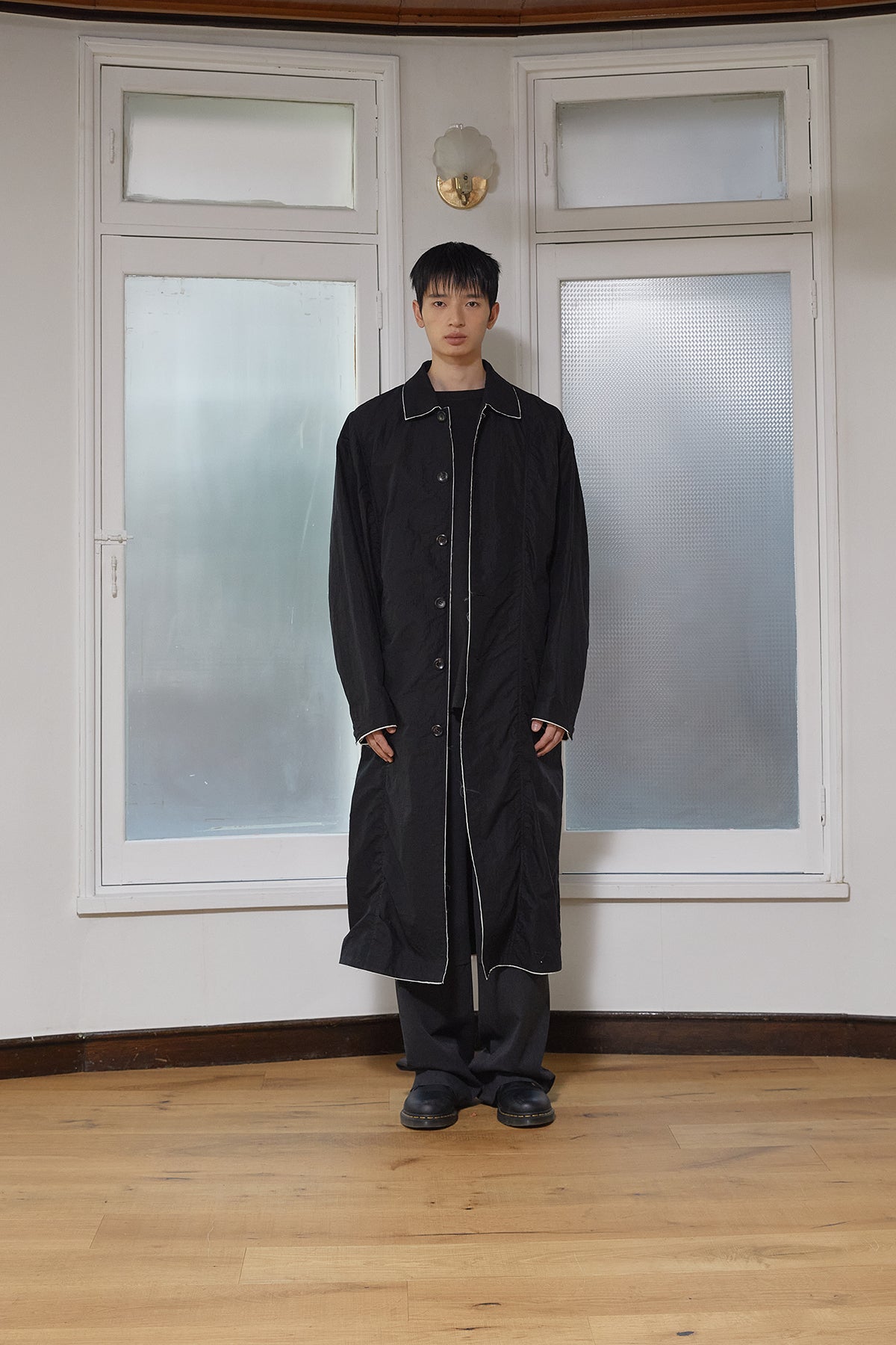 [matinkim] BACK LOGO POINT NYLON LONG COAT FOR MEN IN BLACK