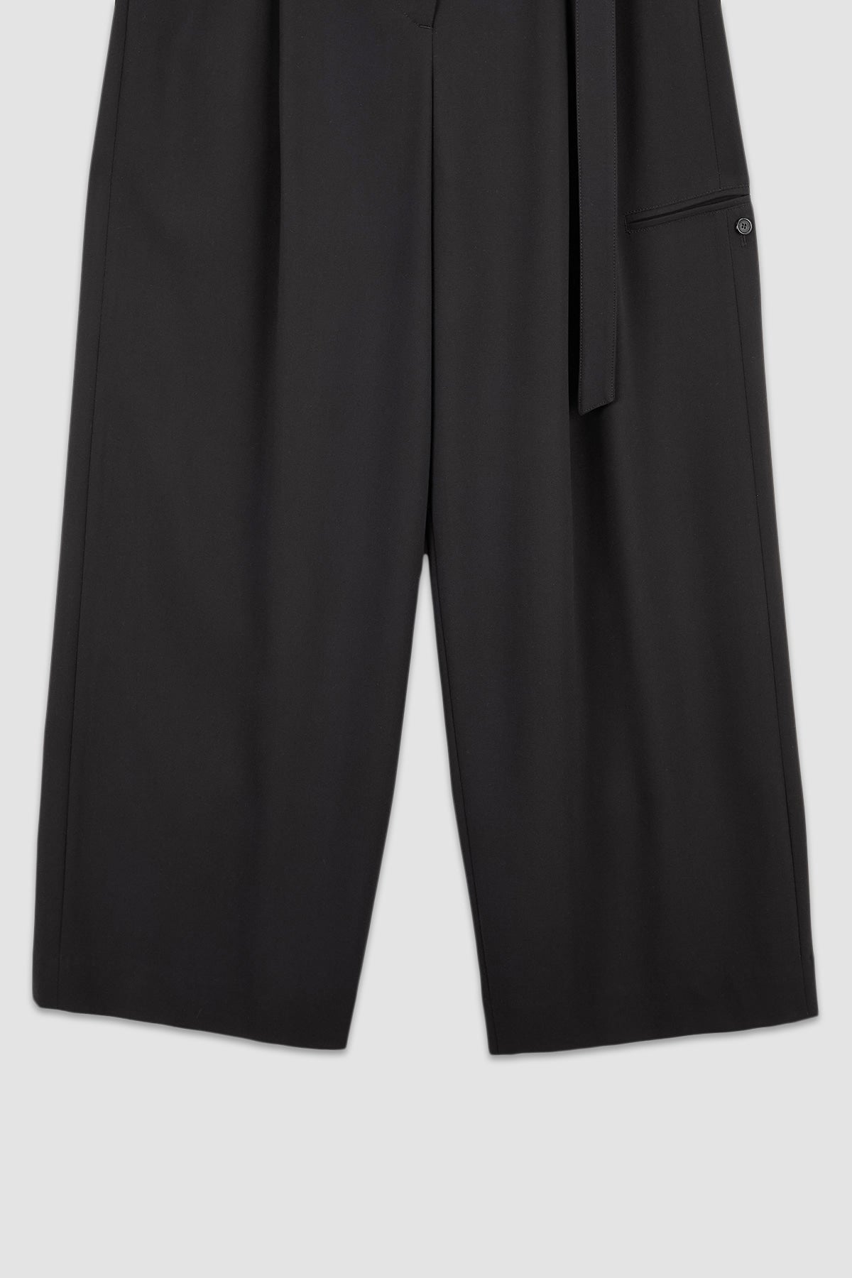 Matinkim Diagonal Zipper Belted Pants IN Black