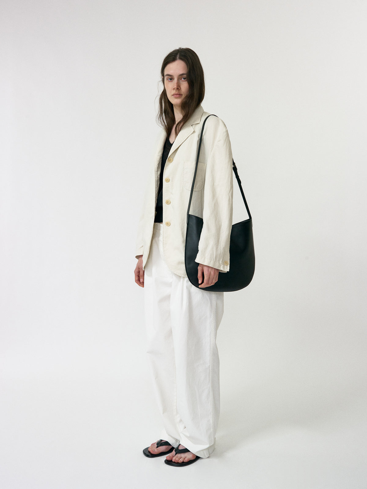Nothing Written Flat round bag (Black)