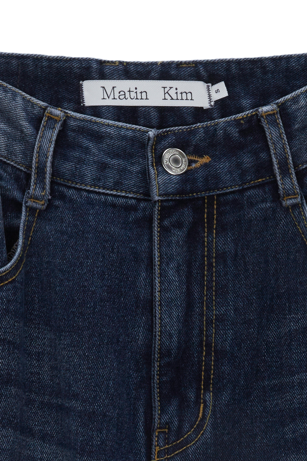 [matinkim] HEM WASHED POINT DENIM PANTS IN NAVY