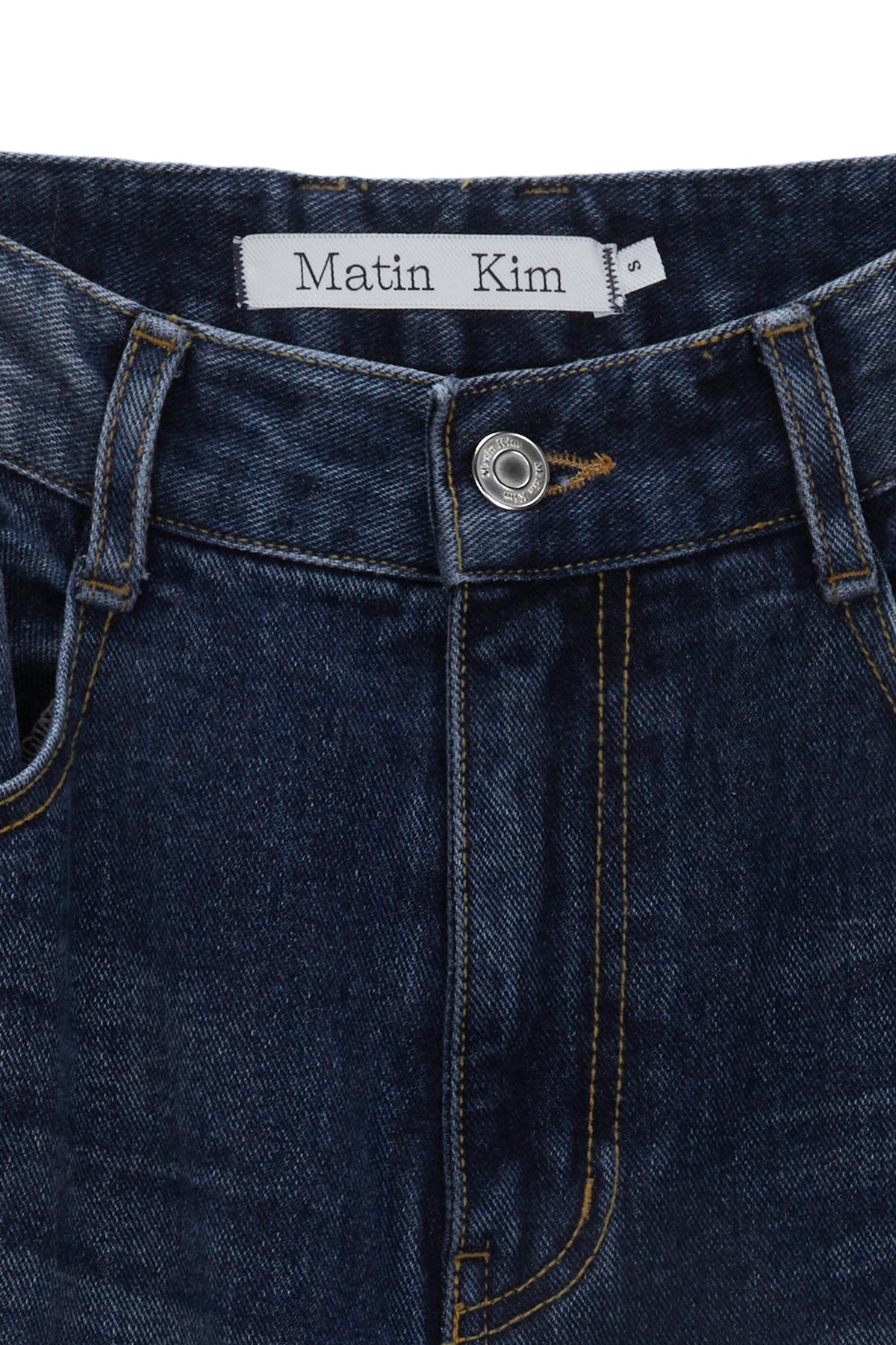 [matinkim] HEM WASHED POINT DENIM PANTS IN NAVY