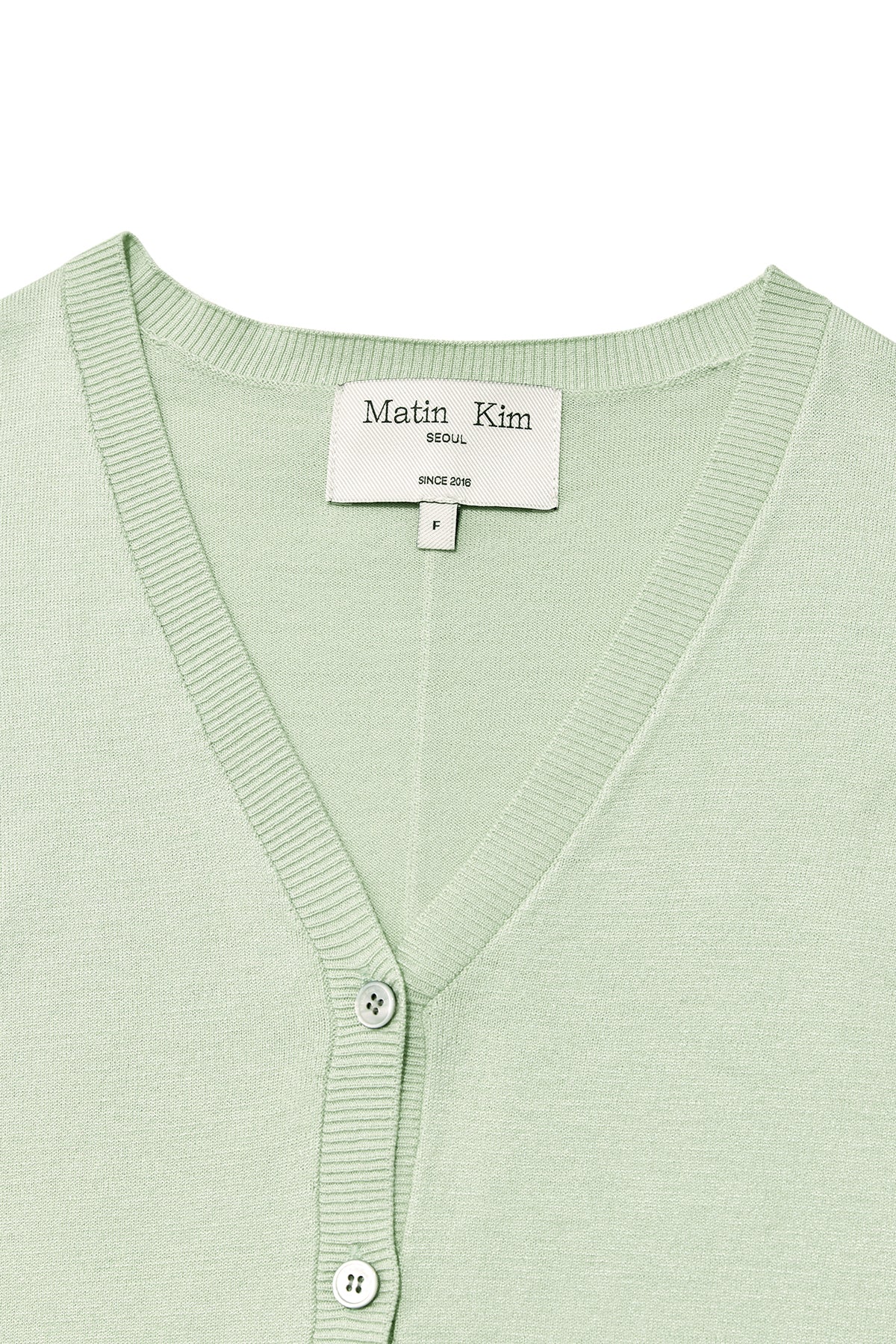 [matinkim] SLIT DETAIL BUTTON CARDIGAN IN MINT