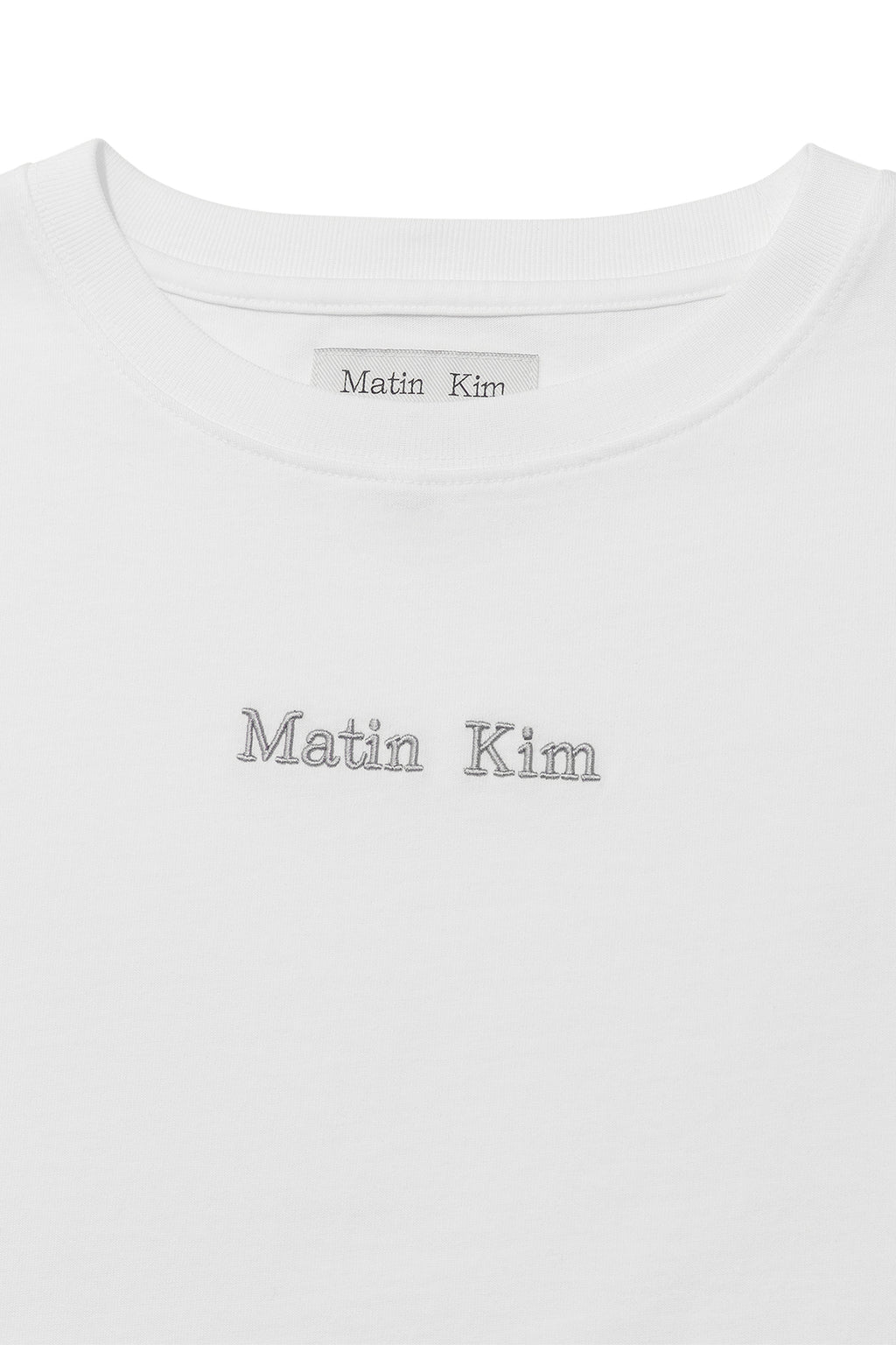 [matinkim] EMBROIDERY SMALL LOGO OVERSIZE TOP IN WHITE