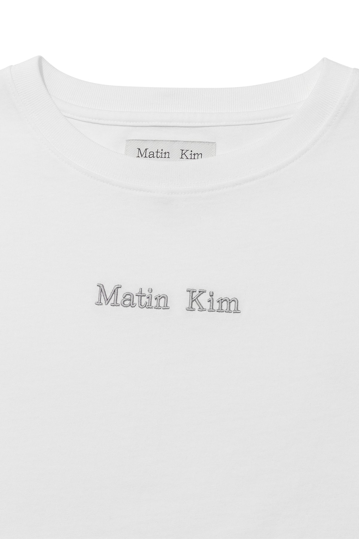 [matinkim] EMBROIDERY SMALL LOGO OVERSIZE TOP IN WHITE