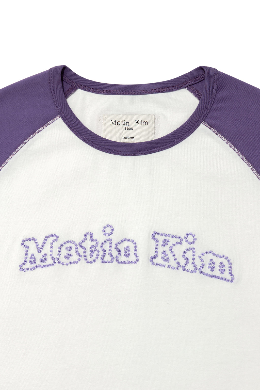 [matinkim] FLOWER STITCH RAGLAN LOGO TOP IN PURPLE