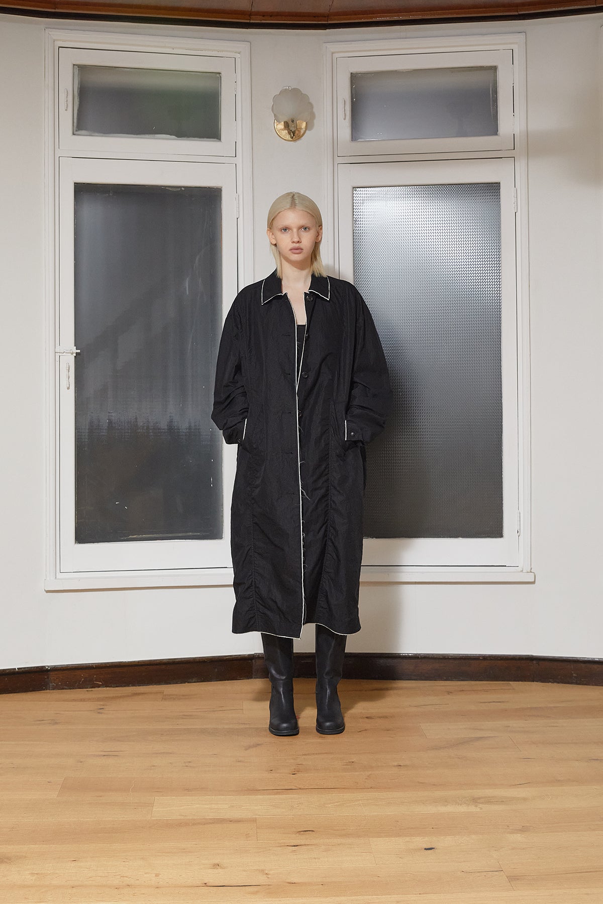 Matinkim Back Logo Point Nylon Long Coat For Women IN Black