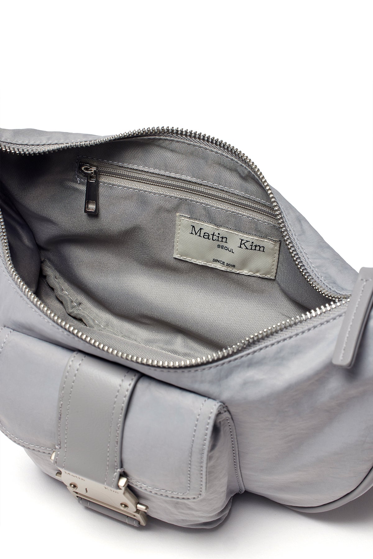 [matinkim] BUCKLE HOBO BAG IN LIGHT GREY