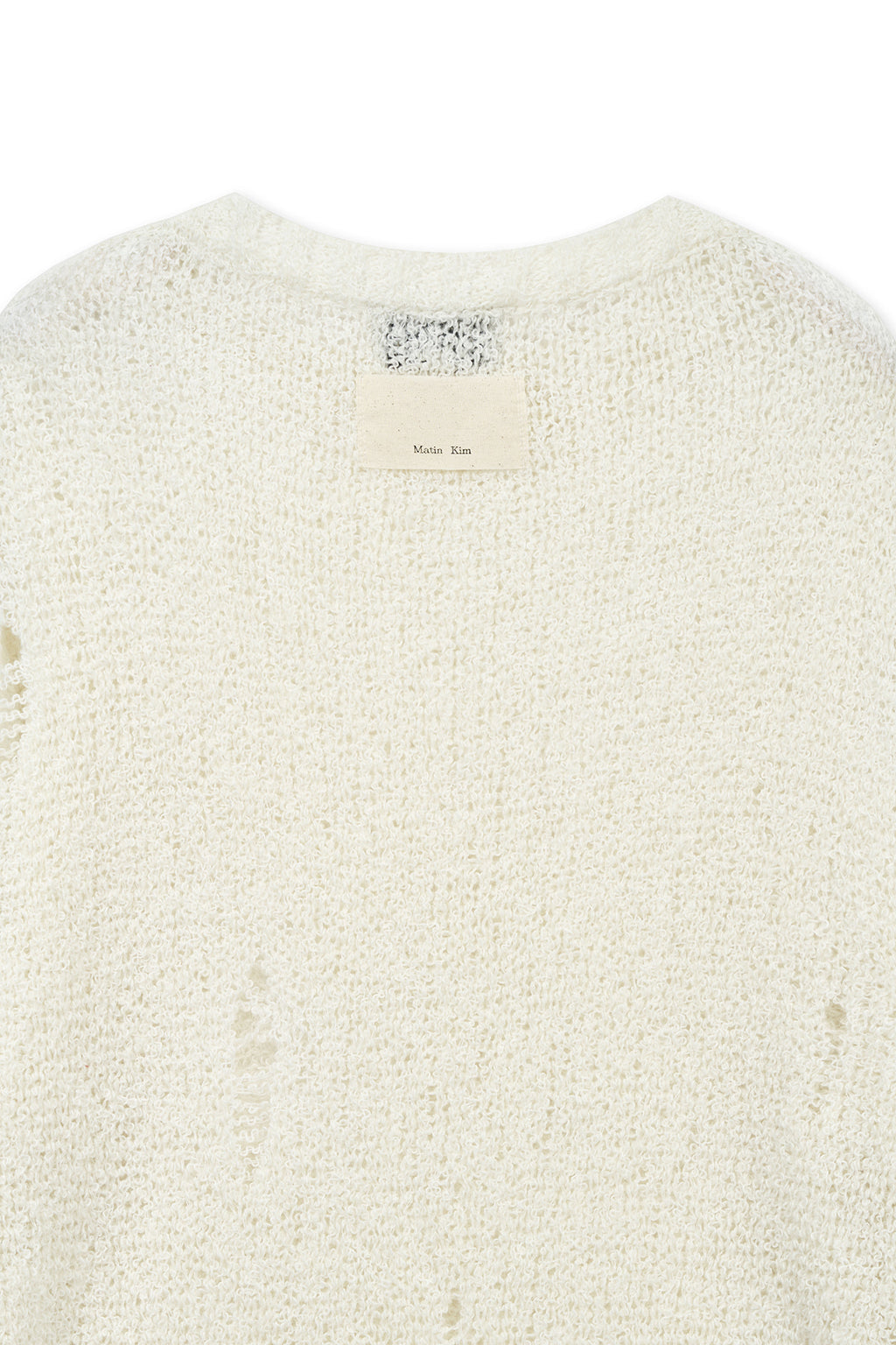 Matinkim Asymmetric Damaged Knit Pullover IN Ivory