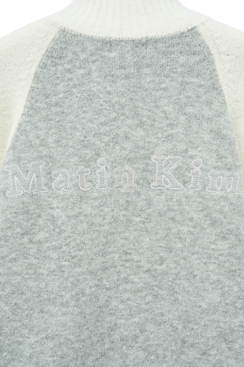 [matinkim] HIGH NECK RAGLAN KNIT ZIP UP FOR WOMEN IN IVORY