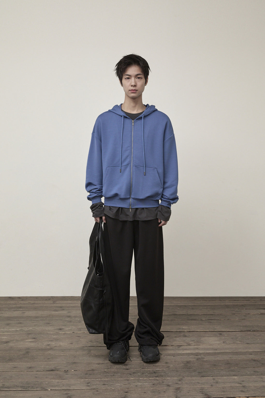 [matinkim] BACK LOGO GLITTER HOODY ZIP UP FOR MEN IN BLUE